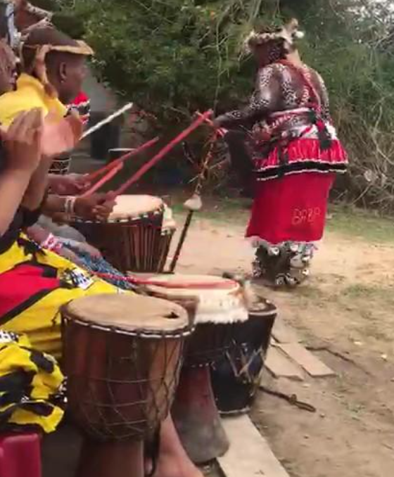 Figure 7. Amagqirha performing the djembe drum during a ceremonial rite.